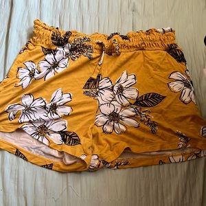 Flowy yellow flower print shorts